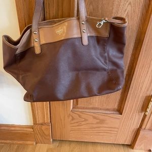 Brown and tan leather fossil bag